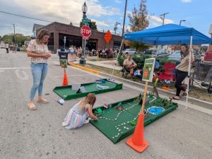 Scouts troops 99 and 999 had mini-golf holes near Vine Street.