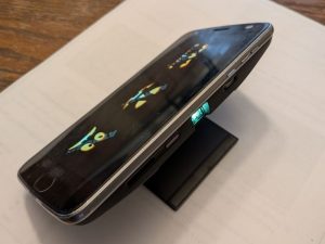 motorola Z phone with projection attachment.